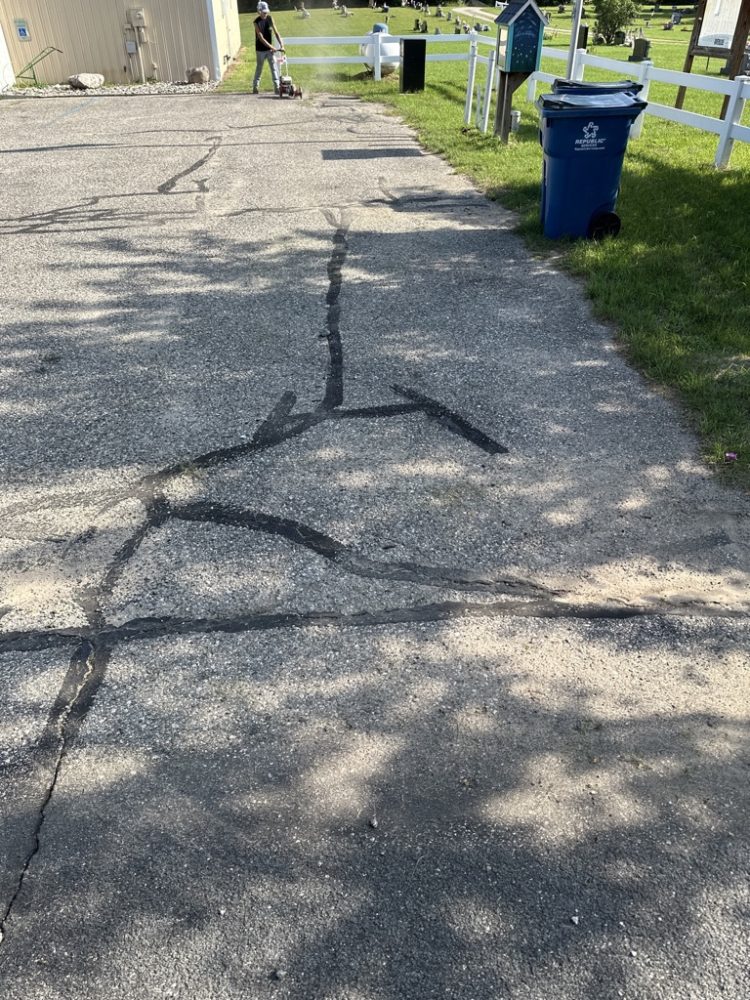 How To Repair Asphalt Cracks In Your Driveway | B&E